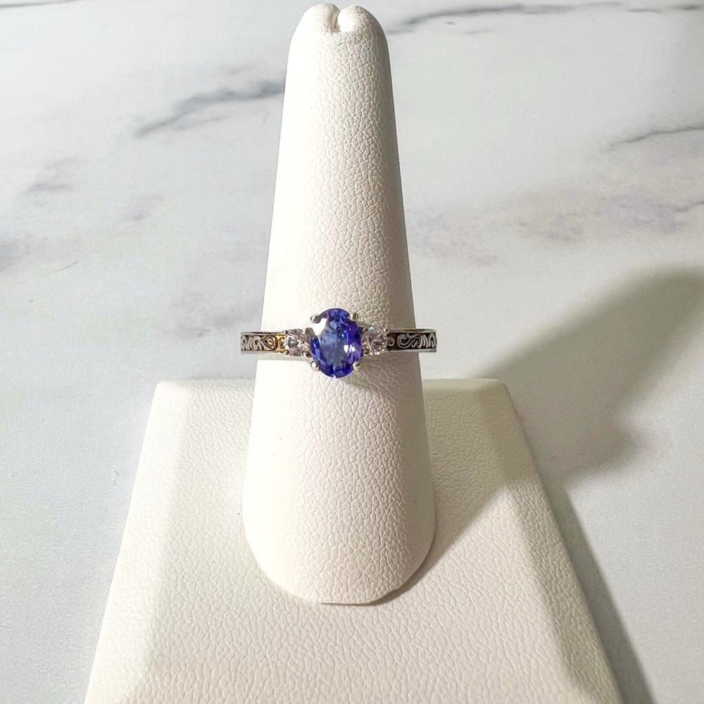 0.75ct Tanzanite w/0.28ctw Created Sapphire Rhodium Over Sterling Silver…